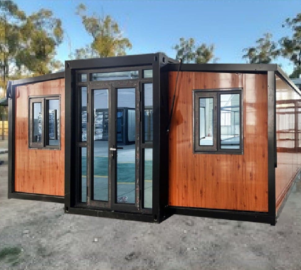 Wood-grain Expandable Home with black trim and glass double doors.