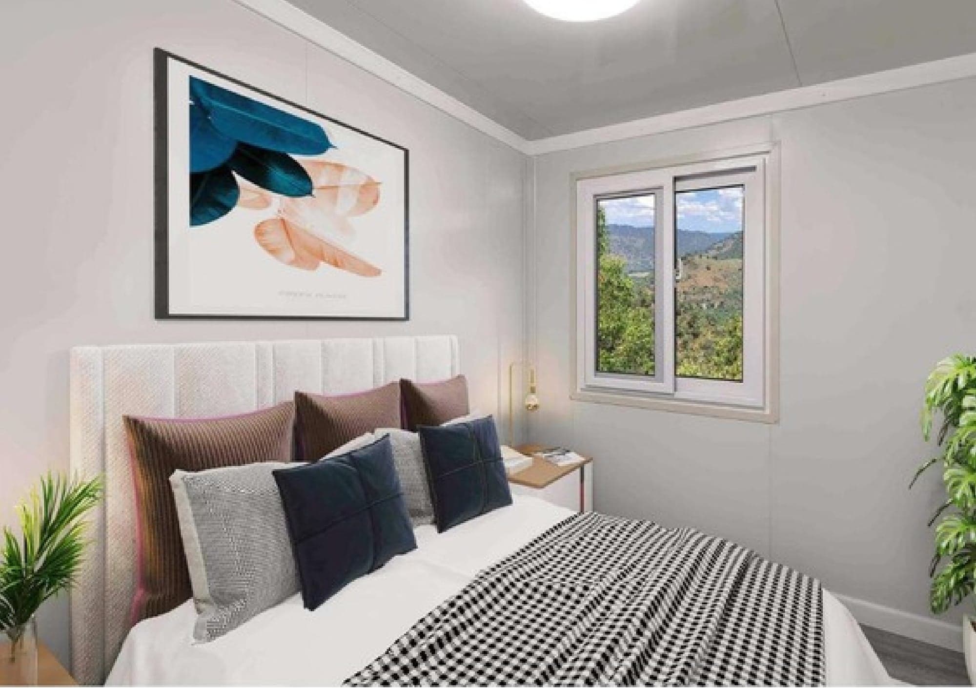 Expandable Home bedroom with a large mountain-view window and upholstered headboard.